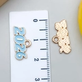 Pendentif émaillé bleu clair 2026 avec bord doré et échelle de mesure précise - KC Or Bleu 2026