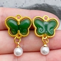 Golden butterfly jewelry pendant with dark green jade inlay and white pearl accent - Green Butterfly Pearl Style (22213)
