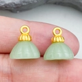 Pair of light green lotus seed pod pendants with gold caps and textured surface - Light Green Lotus Buckle (22233)