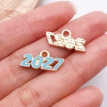 Vue macro des pendentifs 2027 en alliage émaillé bleu clair et plaqué or pour bijoux DIY - Bleu Lac 2027