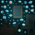 Luminous solar system wall stickers glowing in a dark bedroom with planet and star shapes - Realistic Planets (Blue Luminous) / Blue Glow (MG-YP043)