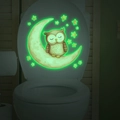 Luminous toilet sticker showing a glowing cartoon owl on moon with stars in the dark - 24*24cm / Green