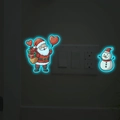 Lichtgevende kerstmuurstickers met kerstman en sneeuwpop voor decoratie van schakelaars - Blauwe Fluorescentie (MG-YK001)