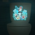 Leuchtender Wandaufkleber mit Vögeln und Blumen auf einer weißen Toilette - Blau / 24x24cm