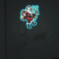 Leuchtender Weihnachts-Wandaufkleber mit Weihnachtsmann und Rentier für Schalter - Blau