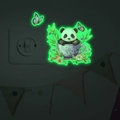 Glow-in-the-dark wall stickers featuring a cartoon panda in a floral teacup near light switch - 13x15cm / Green