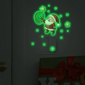 Adesivi murali natalizi fluorescenti con Babbo Natale e stelle su sfondo scuro con interruttore - Luce Verde (13x13cm)