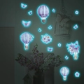 Glow in the dark wall stickers showing purple hot air balloons and butterflies glowing blue - Blue Glow (MG-YP054 Blue Light/30*40cm)