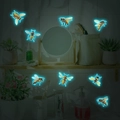 Detail showing various 3D bee wall stickers with luminous blue glow in dark home setting - 20x30cm / Blue