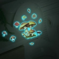 Adesivi per funghi luminosi che brillano di blu sul coperchio di un water - 24x24cm / Blu Luminoso