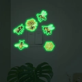 Leuchtende Wandaufkleber mit Bienen und Waben rund um einen Lichtschalter im Dunkeln - 11*17CM / Grün fluoreszierend