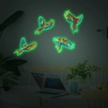Adesivi murali pappagallo luminosi che mostrano contorni verdi in un ambiente buio - Verde