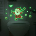 Adesivi per WC di Babbo Natale luminescenti che mostrano l'effetto luminoso al buio - Verde