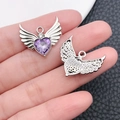 Purple heart gemstone pendant with wings in silver finish, showcasing front and back view - Silver Tone Purple Zirconia (16387)