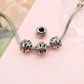 Silver hollow flower beads on snake chain bracelet with vintage retro finish - Hollow Pattern (16480)