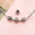 Vintage hollow flower pattern 9mm large hole metal beads on a silver snake chain bracelet - Hollow Pattern (16484)