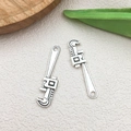 Vintage silver alloy pipe wrench charms with circular hanging holes for DIY keychains - Pipe Wrench (18407)
