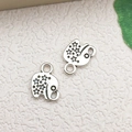 Antique silver elephant pendant with star engravings for DIY jewelry and charm bracelets - Small Elephant (11326) / 8x11mm