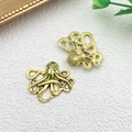 Golden octopus charms in zinc alloy with detailed tentacles for DIY jewelry making - Ocean Octopus (7984) / Gold