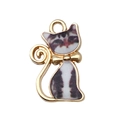 Pendentif chat noir et blanc en alliage avec nœud papillon doré pour la création de bijoux - Chat texture calicot noir et blanc (19116) / 1 Pièce (21x13mm)