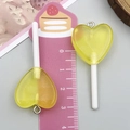 Pendentif sucette cœur en résine avec dégradé jaune orange et anneau en métal - Sucette Cœur Transparent Jaune (24552)