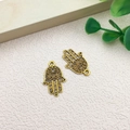 Golden Hamsa Hand charms with intricate cutout patterns for DIY ethnic jewelry making - Hamsa Hand (11114)
