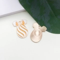 Easter rabbit egg alloy pendant with orange white enamel stripes and gold finish - Yellow Striped Egg