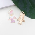 Pink and purple gnome charms with bunny ears and golden enamel finish, dual-side view - Pink Hat Gnome Easter Egg