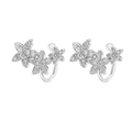 Macro shot of silver flower ear cuffs with shimmering pave zirconia on white background - Triple Row Floral Style (Platinum 003)