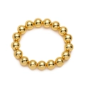 Detalle de una pulsera elástica con cuentas doradas pulidas en un set de 7 joyas de lujo - Pulsera de 12mm / Dorado