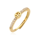 Macro shot of Cancer zodiac ring in gold plating with clear zircon stones and open band - Gold Cancer