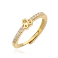 Detailed view of adjustable gold Leo zodiac ring with sparkling cubic zirconia accents - Gold Leo