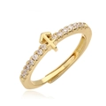 Close-up of gold plated zodiac ring with white cubic zirconia pavé and arrow symbol - Gold Sagittarius