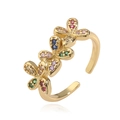 Elegant gold bow clover ring with colorful crystals in a polished adjustable design - Gold with Multicolor Zircon
