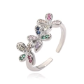 Detail view of adjustable silver ring with colorful cubic zirconia floral butterfly elements - Platinum Multi Zirconia