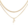 Macro shot of gold layered snake chain with a Sagittarius pendant and sparkling zircons - Gold Sagittarius