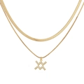 Close-up of double-layered gold snake chain necklace with a sparkling pavé X pendant - Gold Aquarius
