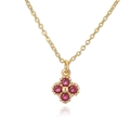 Macro shot of gold clover pendant with four red gemstones on a polished O-link chain - Gold Rose Red Zirconia Clover Necklace