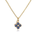 Close-up of gold clover necklace with deep blue gemstones and intricate flower pendant - Gold Blue Zirconia Clover Necklace