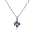 Macro shot of silver clover pendant featuring four deep blue sapphire-style zircons - Silver Blue Zirconia Clover Necklace