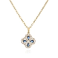 Luxury gold four-leaf clover necklace with blue pear-shaped stones and pavé crystals - Gold Blue Zircon Clover