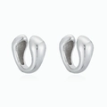 Close-up of polished silver U-shaped ear cuffs with mirror finish and reflective base - Silver Minimalist U-Shape