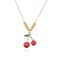 Detail of sweet cherry pendant necklace with red enamel and sparkling zircon accents - Gold Green Leaf Red Cherry Bead Necklace