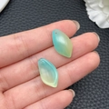 Detail of blue-green gradient lotus leaf pendants in hand showing size and texture - Yellow Green Gradient Petal (21976)