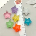 Detailed view of colorful 20mm resin star pendants with scale for DIY jewelry making - Random Luminous Star Pendant