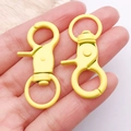 Paar felgele draaibare karabijnsluitingen voor DIY sieraden en tas hardware accessoires - 44x21mm / Geel