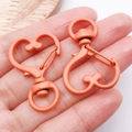 Matte koraaloranje hartvormige karabijnsluiting met 360 graden draaibare wartelring - Oranje Geel