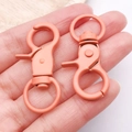 Koraalroze roterende karabijnsluiting 44x21mm voor DIY sleutelhangers en tassen - 44x21mm / Oranje Geel