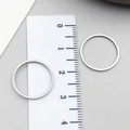 Polished silver stainless steel minimalist band ring with an 18-20mm outer diameter - Gold Round Frame (T1873)