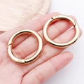 Pair of polished gold metal spring O-rings for handbag straps and keychains - 35mm / KC Gold